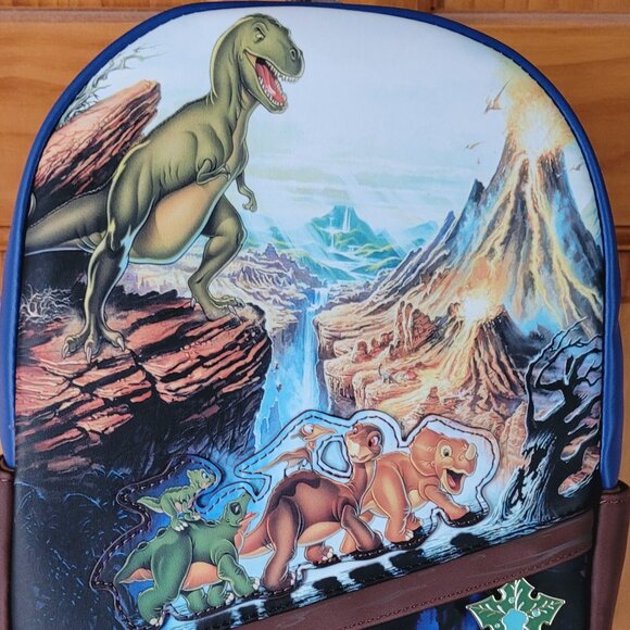 Loungefly Handbags - NWT Loungefly The Land Before Time Backpack